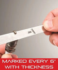 Hands holding a Tempered Steel Thickness Gauge Feeler Stock With Rounded Ends For Carpenters And Home Improvement, 0.50mm, showing markings