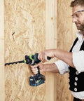 Man using Heavy Duty Brushless Cordless Drill And Driver With Unbreakable Gears And 18 Volt Battery to drill into wood.