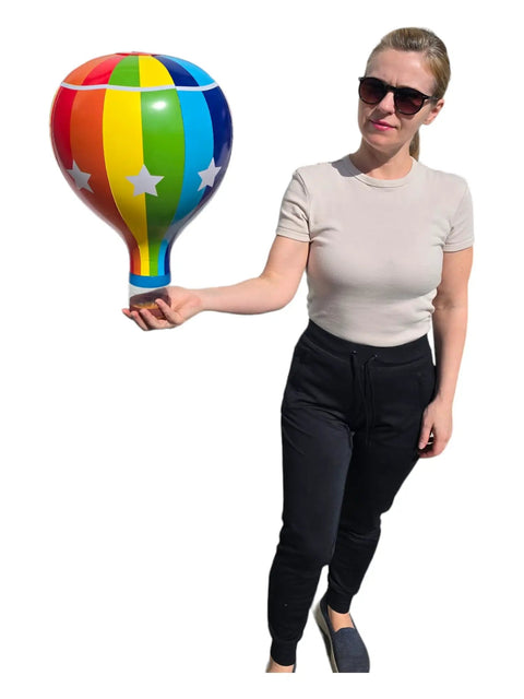 Person holding a Multicolor 18 Inch Inflatable Hot Air Balloons Set With 3 Designs 3 Pack For Kids Parties Party Favors