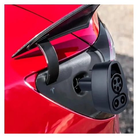 Close-up of Heavy Duty Ev Charging Adapter For Tesla Model 3 Y S X CCS1 Combo DC To AC Power Converter attached to red car.