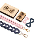 Dope Bow Shape Leather Cutting Die Set Two Pack For DIY Leather Projects with pink and blue leather straps