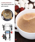 Stainless Steel Electric Grain Grinder High Speed Swing Type Powder Maker shown with cup of ground grain soup