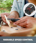 Hands using 2 Piece Crafting Tool Combo Kit Rotary Tool And Wood And Metal Crafter With Universal Bit Compatibility on wood