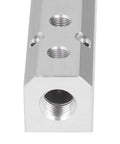 Close-up of a Lightweight Aluminum Pneumatic Block 40x40mm With G1/2 Inlet And G1/4 Outlet, showing inlet port detail and aluminum finish