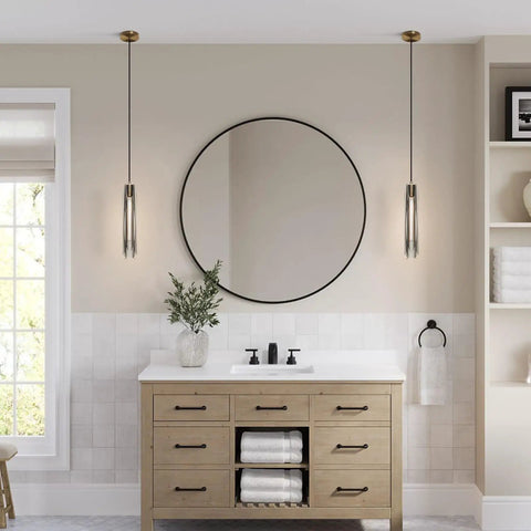 Smokey Crystal Pendant Light In Antique Brass Gold Finish, long tube in bathroom over wooden vanity, mid-century modern style.