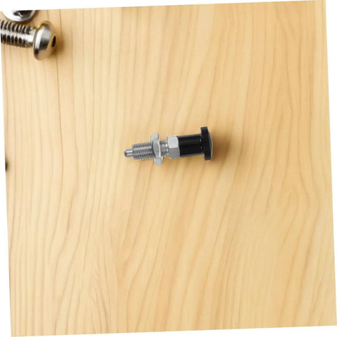 Heavy Duty Stainless Steel Indexing Plunger With Lightning Quick Reset Spring Pin For Factory Positioning And Machine Jigs on wooden background.