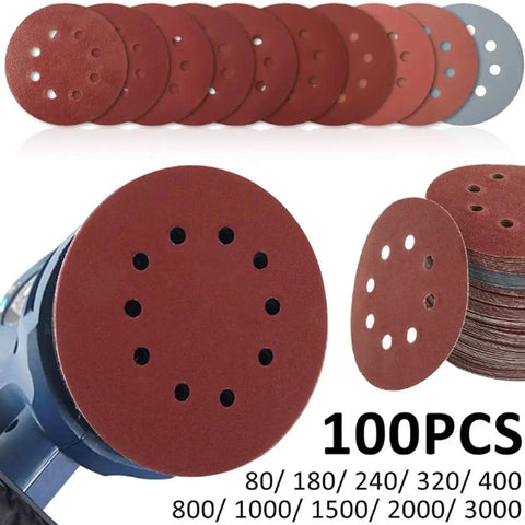 100 Pcs 5 Inch Hook And Loop Sanding Discs, heavy duty alumina paper, showing grits and pre-punched holes for dust-free sanding.