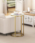 Marble Top C Shaped End Table With Gold Metal Frame beside sofa, small space accent table for living room.