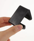 Hand holding black Sectional Sofa Fasteners And Rattan Furniture Clips For Wicker Chairs, Outdoor Couch Clips, easy install, 4.25x3x3.5 cm