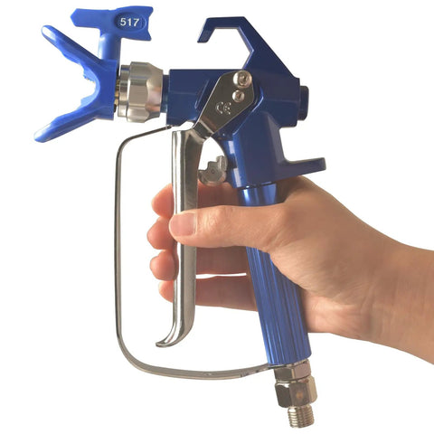 Hand holding G5 Airless Spray Gun With Guard And 517 Tip For Airless Paint Sprayers, Lightweight Forged Aluminum, 3600 PSI Max