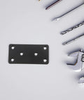 Stainless Steel Flat Metal Joining Plates For Wood, Flat Straight Brackets With Holes, tools around, black finish.