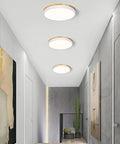 Modern Wood Trim LED Ceiling Light Fixture Sleek Round Flush Mount Not Dimmable 4000K Neutral White Glow in hallway interior