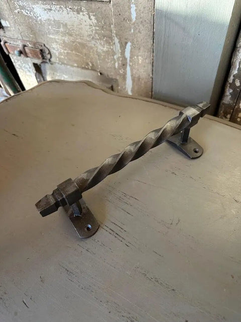 Set Of 2 Oversized Cast Iron Door Pull Handles With Twisted Forged Design for rustic barn shed door in a vintage setting