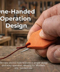 Close-up of Rope Anchor Hook One Handed Operation Portable Chalk Line Anchor Tool in use, securing rope with steel pin.