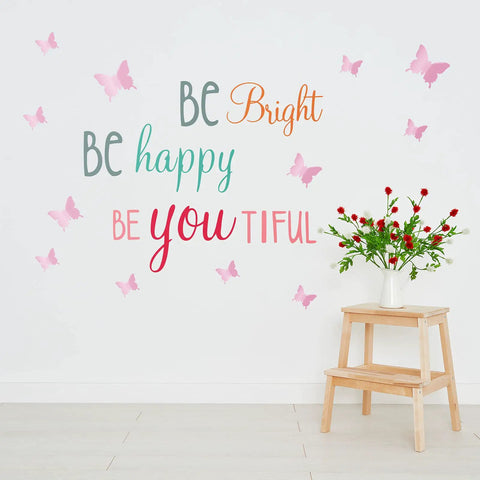 20 Sheets Inspirational Quotes And 3D Butterfly Wall Decals Set For Girls Bedrooms And Living Rooms Pink Pastel Decor With 8 Quote Sheets And 12 Butterfly Sheets In 3 Sizes Be Bright Be Happy Be You Tiful on wall above stool and flowers