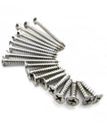 410 Stainless Steel Washer Screws Self Tapping Flat Head With Phillips Drive shown in multiple pieces on a white surface