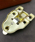 Close-up of 4 Pack Antique Wooden Box Hinges And Toggle Latch Set for crafts with gold finish, 2.36 in by 1.57 in size.