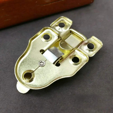 Close-up of 4 Pack Antique Wooden Box Hinges And Toggle Latch Set for crafts with gold finish, 2.36 in by 1.57 in size.