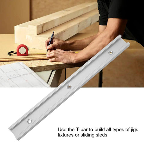 Aluminum Alloy T Slot Miter Track Jig with Smooth Sliding Action for Woodworkers on table with measuring tape