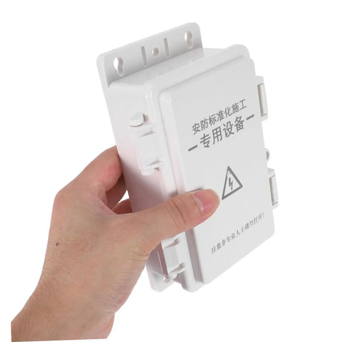 Ultimate Weatherproof Plastic Electrical Junction Box For Outdoor Use, held in hand, white plastic, compact design for easy installation.