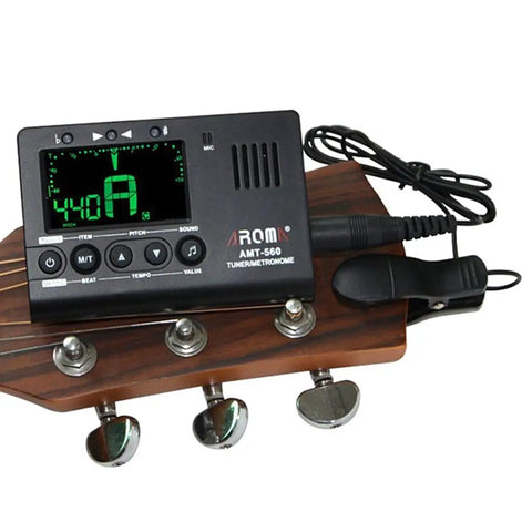 Universal Digital Metronome Tuner with Clip On Microphone for all instruments displayed on guitar headstock