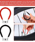 No Sweat Road Warrior Bike Repair Kit featuring single spoke wrenches for 14G adjustment, one red and one black, shown in use.
