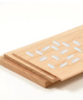 White Shutter Repair Pins on wooden surface, showcasing 120 Piece Movable Louver Fasteners, Heavy Duty Replacement Parts.