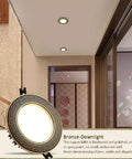 12 Pack 5.9 In Recessed LED Downlights Featuring Hand Carved Brass Trim For No Glare Performance Dimmable Circuitry Allows You To Dial In Perfect Ambiance in a modern hallway.