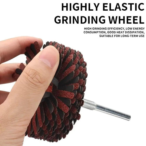 Close-up of 7 Pack Mounted Flap Wheel Set For Sanding And Polishing Wood And Metal Grit 80 To 400 showing hand holding mop wheel