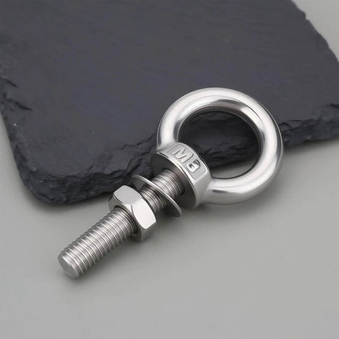 Four Pack Stainless Steel Lifting Eye Bolts And Washers M8 X 35Mm For Ifor Williams Horsebox Trailers, close-up of bolt on slate surface.