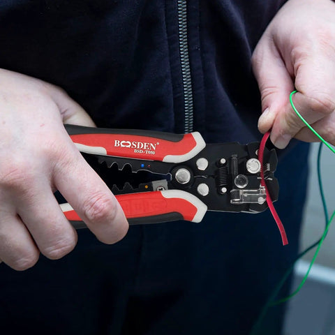 Person using Automatic Wire Stripper Pliers With Self-Adjusting 3-In-1 Function for Stripping Crimping and Cutting 10-24 AWG Wires