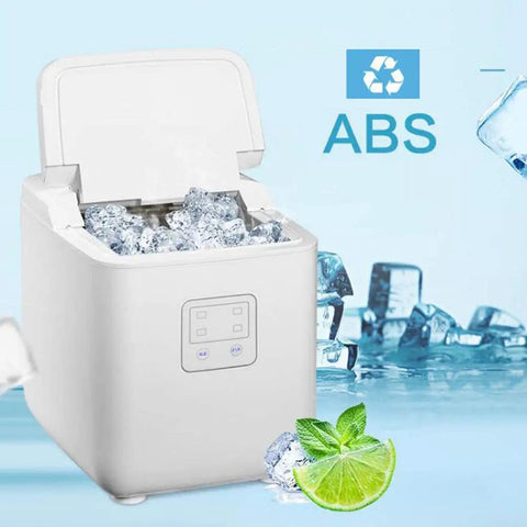 Super Compact Countertop Ice Maker Machine For Home And Bars Yields Fresh Cubes In Six Minutes Flat showcasing ice-filled compartment and lime.
