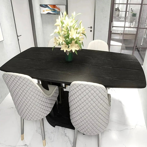 Gotta Have This Slick Black Peel And Stick Vinyl Wrap For Kitchen Countertops And Walls on a dining table with white chairs and flowers.