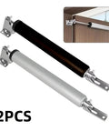 Two Piece Automatic Door Soft Close Kit With 90 Degree Positioning Stop in silvery finish, mounted on cabinet door.