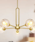 Gold Globe Giant Pendant Chandelier 5 Light Sputnik Ceiling Fixture With Dope Clear Glass Shades in modern living room