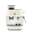 Top Shelf Semi Automatic Espresso Machine With Built In Conical Burr Grinder Dual Thermoblock Heating Precision Controls And Authentic 1950s Retro Vibe In Smooth Cream Finish with two espresso cups.