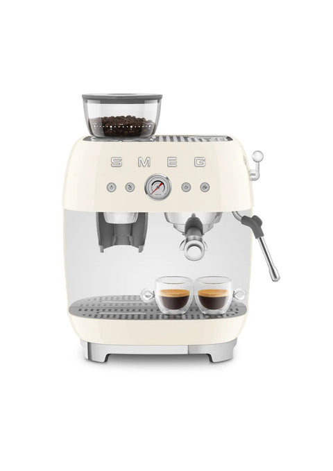 Top Shelf Semi Automatic Espresso Machine With Built In Conical Burr Grinder Dual Thermoblock Heating Precision Controls And Authentic 1950s Retro Vibe In Smooth Cream Finish with two espresso cups.