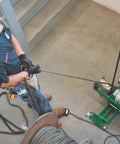 Worker operating Heavy-Duty UT10-22 Puller for Cable and Wire Pulling, Pro-Grade Tool Built for Real-World Job Site Toughness