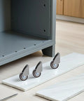3pcs 6pcs Rigid Furniture Moving Caster Wheels with Rubber, Silent Mobility on marble surface near cabinet.