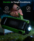 Holding Massive 15000mAh Rechargeable Telescopic Camping Light Lantern With Reinforced Tripod Base in hand at night, Green
