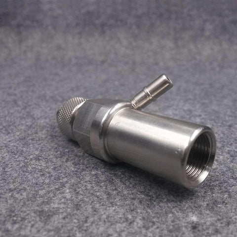 Side view of stainless steel waterjet mixing chamber adapter with side inlet nozzle and threaded bore.