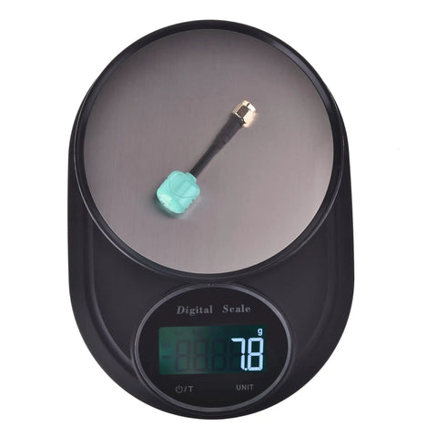 Two Pack Lollipop 4 Plus FPV Antennas 2.6dBi 5.8GHz RHCP on digital scale showing weight