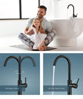 Oil Rubbed Bronze Freestanding Tub Filler With Single Lever Handle Floor Mounted Brass Bath Faucet All Metal Solid Brass Construction Sleek Modern Style Tub Tap Without Handheld Spray in a bathroom setting with father and child in the foreground.