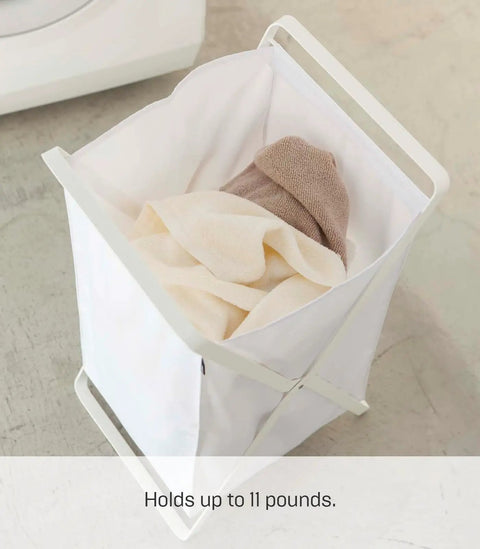 Foldable Laundry Basket With Steel Frame And Polyester Bag Portable Hamper Organizer For Home Collapsible Laundry Tote In White showing top view with clothes inside