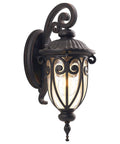 Antique Bronze Outdoor Porch Light With Wall Mount Vintage Exterior Sconce Lantern For Garage And Front Door 18 Inch Patio Fixture With Seeded Glass Shade And Warm Welcoming Glow Retro Vibe in bronze with ornate design