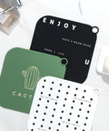 Hair Stopper Shower Drain Strainers Silicone Adjustable, A set of colorful silicone mats in various designs on a countertop.