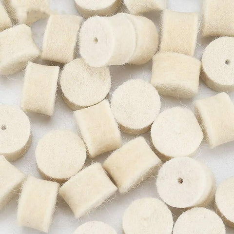 Fifty Piece White Thirteen Millimeter Wool Felt Polishing Buffing Wheels With Four Shank Adapters feature dense white felt for refining surfaces.