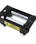 Heavy Duty Winch Roller Fairlead 2000LB Capacity Cable Guide for Electric Winch, Shockproof and Built Tough Wire Rope Guide for Rough Terrain and Off Road Adventures. Black steel roller fairlead with warning label, angled view