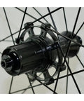 Close-up of hub and straight pull spokes on Carbon Road Bike Wheelset 40mm 50mm Clincher Tubeless Ready Rim 25mm Wide
