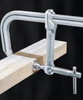 Heavy Duty F Clamp With Drop Forged Steel Construction, adjustable rotating pad securing wood for woodworking task